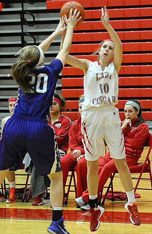 Van Wert's Meghan Moonshower (10) shoots over a Fort Recovery defender in a non-conference game won by a point by the Lady Indians. (Jan Dunlap/Van Wert independent)