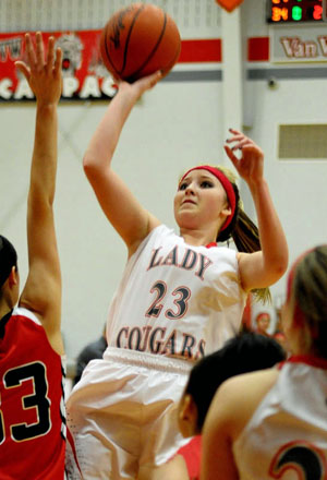 Van Wert's Emma Kohn (23) shoots over a Shawnee defender in the Lady Cougars' 63-48 loss to the Lady Indians. (Jan Dunlap/Van Wert independent)