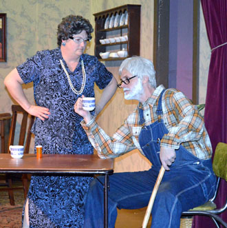 Joelle May and Chris Lybold during a scene from the Van Wert Civic Theatre production of "Rex's Exes."  (VWCT photo)