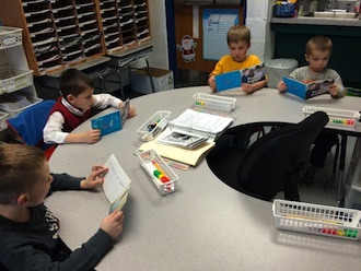 Kindergarten class reading a book in Title 1 Reading. (Photo submitted.)