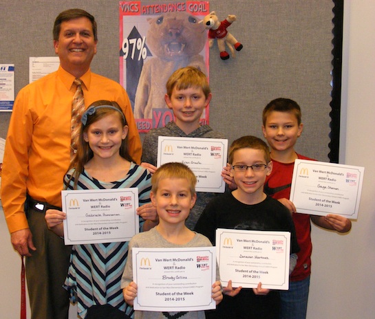 Congratulations to the Van Wert Elementary Students of the Week! Pictured with Kevin Gehres, Principal, and Justin Krogman, Assistant Principal, are students chosen by their teachers for striving for excellence in all they do: Evan, Grade 5; Gabrielle, Grade 4; Gage, Grade 3; Donavan, Grade 2; and Brody, Grade 1. Each student received a free Mighty Kids Meal from our local McDonalds and a certificate from WERT Radio. (Photo submitted.)