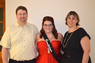 Peony Pageant contestant Taylor Hughes and her parents after the pageant on Friday nights. (Photo by M. Germann.)