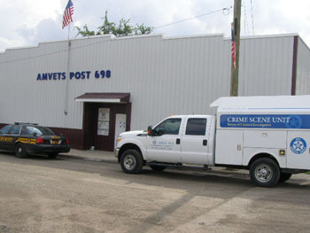 A Van Wert County Sheriff's cruiser and Ohio Bureau of Criminal Identification and Investigation vehicle sit outside Amvets Post 698 in Middle Point on Friday. (photo submitted)
