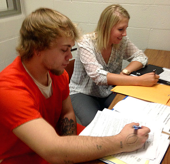 Summer bailiff intern Claire White (right) works on life skills with a Van Wert County Correctional Facility inmate. (photo submitted)