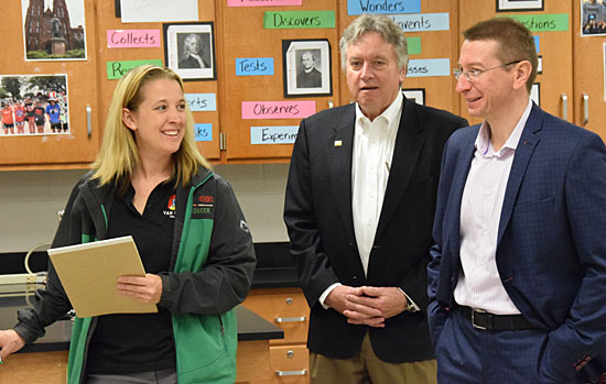 Ukraine-born physicist Anatoliy Glushchenko (right) tours a Crestview science classroom with Van Wert County Economic Development Director Sarah Smith (left) and author Mark Lautman. (Dave Mosier/Van Wert independent)