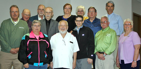 Shown is Major Art Barter with a number of Salvation Army staff and board members. (Salvation Army photo)