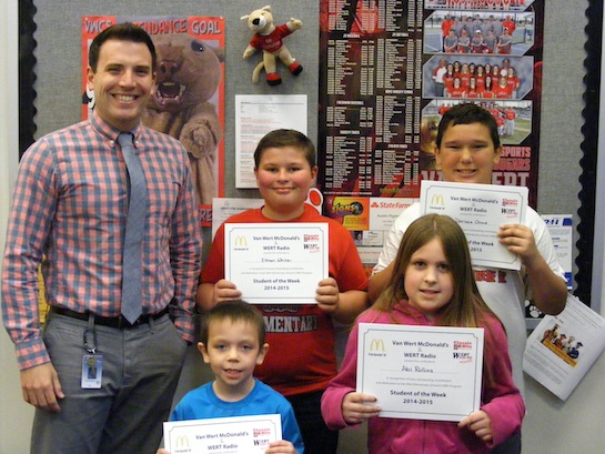 Congratulations to the Van Wert Elementary School Students of the Week!  Pictured with Justin Krogman, Assistant Principal, are students chosen by their teachers for being great listeners:  Ethan, Grade 5; Darious, Grade 4; Abi, Grade 2; and Kylerr, Grade 1. Not pictured is Debbie, Grade 3.  Each child received a free Mighty Kids Meal from our local McDonalds and a certificate from WERT Radio. (Photo submitted.)