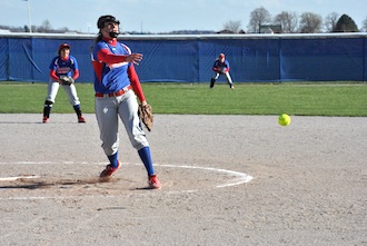 Senior Terra Crowle throws out a pitch for the softball team. The Knights earned top NWC honors this season and begin tournament action next week. (Photo submitted.)