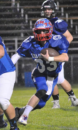 Wayne Trace quarterback Tyler Showalter (33) runs with the ball during Friday's VWCH All Star football game held at Eggerss Stadium in Van Wert. (Jan Dunlap/Van Wert independent)