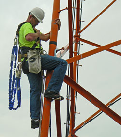 A Wabash Communications worker climbs installs updates on a company tower. (photo submitted)