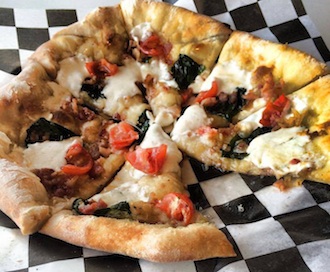 Wood-fired pizza by Pizza Diva of Fort Wayne, Ind., will be available during the Eats on the Streets event on July 11 at the Wassenberg Art Center. (Photo submitted.)