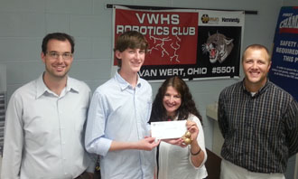 Shown are (from the left) Main Street Van Wert Program Manager Adam Ries, VWHS senior and Robotics Team member Nick White, Wassenberg Art Center Executive Director Hope Wallace and Robotics Team Coach Zane McElroy. (photo submitted)
