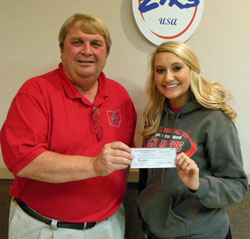 Elks Exalted Ruler Alan Lautzenheiser (left) presents Katelyn Welch of the VWHS Senior Class with a donation to assist with the class’s Holiday Extravaganza for Habitat for Humanity.  (photo submitted)