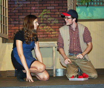 Audrey (Lainie Jones) and Seymour (Skylar Whitaker) share a tender moment during Lincolnview High School's production of Little Shop of Horrors before the mayhem begins. (photo by Dave Walker for the Van Wert independent)