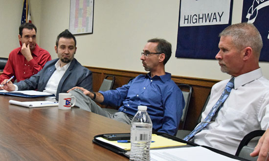 Van Wert County Commissioner Todd Wolfrum (second from right) talks during an economic development discussion held  Tuesday. Looking on are (from the left) Main Street Van Wert Program Manager Adam Ries, Main Street Board member Eric Hurless, and Commissioner Thad Lichtensteiger. (Dave Mosier/Van Wert independent)