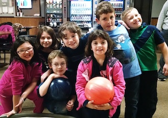 The Lincolnview Learning Academy had a blast at Olympic Lanes after school on Thursday Dec. 17. From left are: Josie, Harlee, Zachary, Steven, Jamie, Isaiah, and Keagan.  (Photo submitted.)