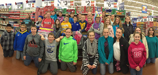 Lincolnview sixth-graders pose while shopping at Walmart for needy families. (photo submitted)