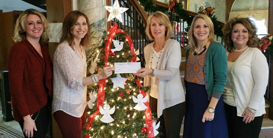 Purmort Bros. donates to YWCA 12-2015