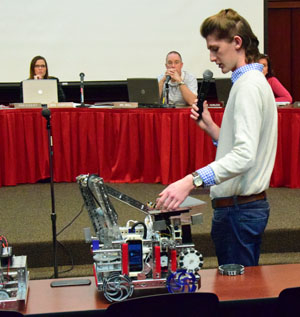 VWHS Robotics Team member Nick White describes the construction of one of the team's robots during Wednesday's meeting of the Van Wert City Board of Education. (Dave Mosier/Van Wert independent)