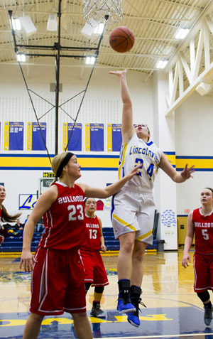 Lincolnview's Kayla Schimmoeller (24) goes up for a layup against Columbus Grove on Thursday. The Bulldogs won the game 74-30. (Bob Barnes/Van Wert independent)