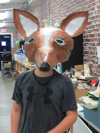 Papier maché masks were made by ArtReach students at the Wassenberg Art Center. ArtReach is an afterschool art program offered by the art center and open to area students ages 7–15. (Photo submitted.)