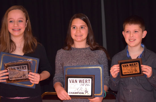 2016 Van Wert County Spelling Bee Champion Una Van Wynsberghe (center) is flanked by second-place finisher Grace Doctor (left) and Zander Pence. (Dave Mosier/Van Wert independent)