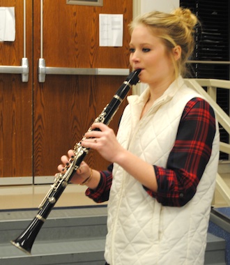 Junior Tiffany Weaver practices her Jazz Band music during study hall. (Photo submitted.)