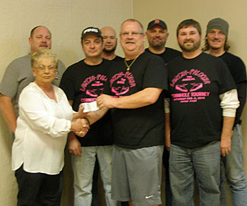 Shown with city DARE Officer Greg Blackmore (accepting check from a Women of the Moose representative) are committee members from the Lautza-Palooza Tournament (photo submitted)