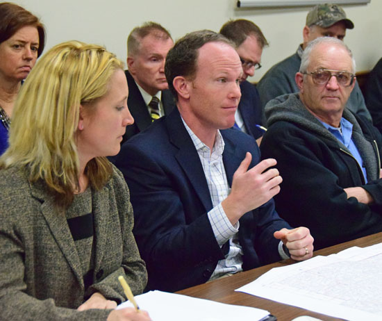 Scott Hawken (center) Apex Clean Energy development manager, talks about the company's wind farm project in Van Wert County. At left is Sarah Moser, recently hired Apex developer. (Dave Mosier/Van Wert independent)