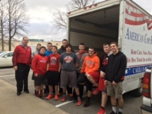 Members of the Van Wert High School Football team’s “Recking Crew”  earned another community donation by rallying to help the Van Wert County Health Department do an “It’s Almost Spring Clean-Up.” Expired protective gear such as gloves, facemasks, and gowns were donated to the Vantage Career Center, and archived records were moved to secure storage in the County Annex. Solid teamwork was clearly evident as the task was completed efficiently and in record time. Hiring the Cougars is the way to go for big jobs! To line up help from the VWHS Football team, contact head coach Keith Recker at 419.238.3350.  (Photo submitted.) 