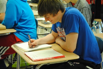 Sophomore Grant Schlagbaum works on his junior schedule for next year. (Photo submitted.)