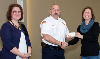 Pictured are Buckeye Insurance Professionals representatives and Central Insurance employees Rebecca White (left) and Shonda Vorst with Van Wert Fire Department Chief Jim Steele.