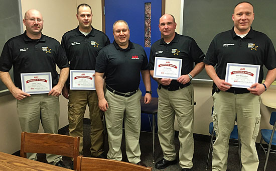 Van Wert County sheriff's deputies recently attended ALICE training that focuses on helping potential shooting victims survive. With instructor Lt. Joe Hendry (center) are (from the left) Sergeant Andy Tracey and Deputies Seth Karl, Ed Klausing, and Mike Biberstine. (photo submitted)