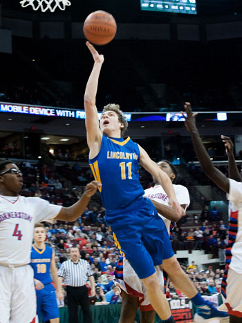 Lincolnview's Trevor Neate (11) goes in for a layup against Cornerstone Christian in the Division IV state championship game on Saturday. Neate led the Lancers with 16 points and was on the Division IV All- Tournament Team. (Bob Barnes/Van Wert independent)
