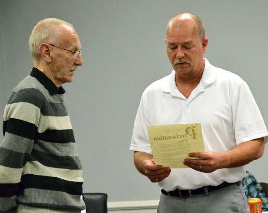 Van Wert City Council President Pete Weir (right) reads a proclamation honoring former mayor Don Farmer for his years of service to the city. Also honored was former mayor and longtime City Councilman Stan Agler, and former Council clerk and mayor's secretary Vivian Thompson. (Dave Mosier/Van Wert independent)