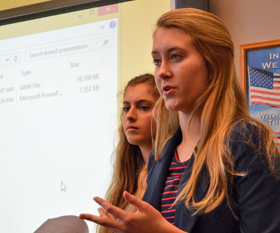 Crestview students Hannah Bowen and Leslie Skelton gave a presentation on the Kids Against Hunger program during Thursday's Crestview Local Board of Education meeting. (Kelsey Clemons/Van Wert independent)