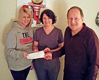 Members of The Ohio State University Alumni Club of Van Wert and Paulding Counties (from the left), Emily Tempel, Missie Bowman, and Carl Jeffery, prepare for the Ohio State University Alumni Association's Volunteer Month of Service. (photo submitted)