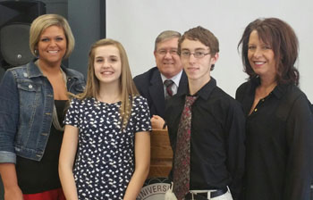 Callahan Wolfrum (second from right) the boys' winner of the Optimist Club's Lima Regional Oratorical Contest, is shown with the girls' winner, Madison Downing of Lima Shawnee and contest judges. (Optimist Club photo)