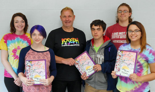 Taylor donates to LifeLinks yearbooks 6-2016