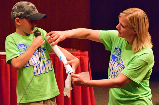 Van Wert Elementary School teacher Marty Hohman and a student display a model of the bones in his left arm (the arm he broke this past school year) during a presentation on Hohman and VWHS chemistry teacher Mary Kramer's science camp for elementary students. (Dave Mosier/Van Wert independent)