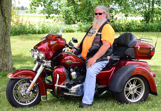 Pastor Steve "Slowride" Haskin poses on his Harley-Davidson motorcycle. (photos by Dave Mosier/Van Wert independent)