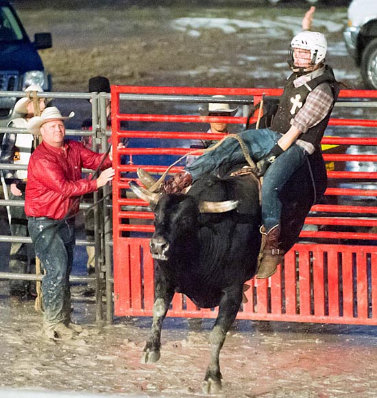 Bull riding was just one of the events held Tuesday evening during the Bulls & Barrels Rodeo in front of the grandstand on the Van Wert County Fairgrounds. Bob Barnes/Van Wert independent