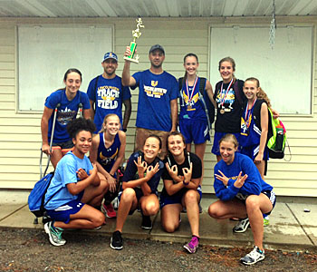 The Lincolnview girls' cross country team poses with its third-place trophy at Wayne Trace. (photo submitted)