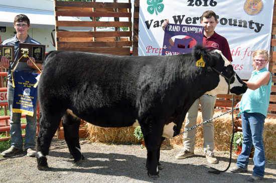 Paulding Putnam Electric Cooperative purchased Addie Sorgen's Grand Champion Show Steer this year. Shown with Addie and her steer is Peter Niagu from PPEC. Dave Mosier/Van Wert independent