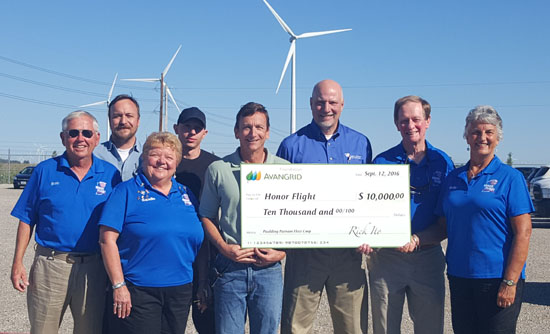 Shown are (from the left) Bob Myer with Northeast Indiana Honor Flight, Matt Fulton with Avangrid Renewables (also a United States Navy veteran, Sandie Myer with Honor Flight, Isaiah Preece with Avangrid Renewables (also a U.S. Air force veteran), Neil Voje with Avangrid Renewables (also a U.S. Navy veteran), Paulding Putnam Electric Co-op President George Carter, and Dennis Covert and Nellie Keltner with Honor Flight. (photo submitted)