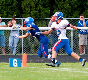 Crestview's Chase Clark (5) hauls in a Drew Kline pass for a touchdown early in the second quarter of Friday's 42-0 win against Wayne Trace. Bob Barnes/Van Wert independent