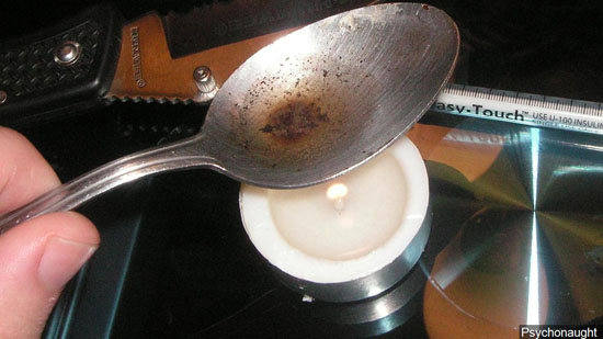 Heroin being prepared for injection. MGN Online photo