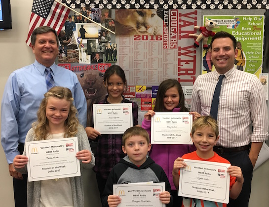 “Friendliness” is the Van Wert Elementary School Word of the Week!  Congratulations to the Van Wert Elementary School Students chosen for the Word of the Week award!  Pictured with Mr. Gehres, Principal, and Mr. Krogman, Assistant Principal, are students recognized for being friendly.  Award winners this week are Wyatt, grade 1; Brogan, grade 2; Bella, grade 3; Aliah, grade 4; and Riley, grade 5.  Each child received a free Mighty Kids Meal from our local McDonalds and a certificate from WERT Radio. (Photo submitted.)