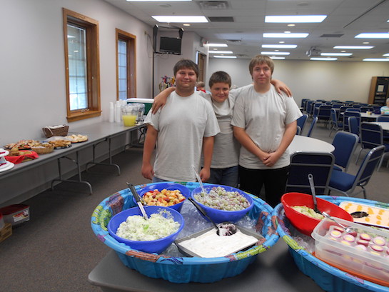 Students from the middle school and high school classes of LifeLinks Community School helped out at the Community Health Professionals salad buffet on September 22.  The boys bused tables, assisted people with their trays, and refilled drinks.   This was the first time LifeLinks has helped with this fundraiser and from all the good compliments about these boys' work they're sure to be asked to help again.   Pictured left to right: Thomas Murphy, Jayden Michaels, and Justin Roberts. (Photo submitted.)