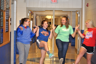 Mary Poppins cast members Becca Daugherty, Elizabeth Mitchener, Ally Fegley, and Kristen Etzler practice their number “Supercalifragilisticexpialidocious” during a rehearsal. (Photo submitted.)